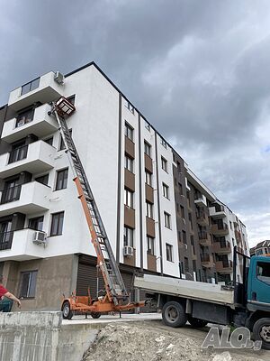 Услуги с мобилен хаспел, товарен повдигач.