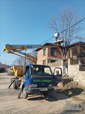 Рязане на опасни дървета и клони с автовишка