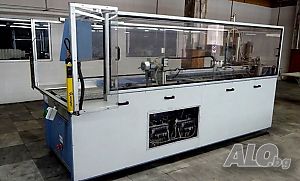 Italian Robot-line machine for folding, packing and barcoding for 8000pc.singlet or t-shirt per day